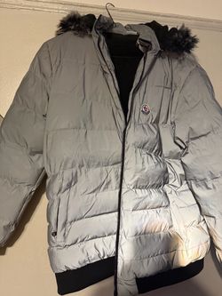 Grey Moncler coat with black fur inside and hood