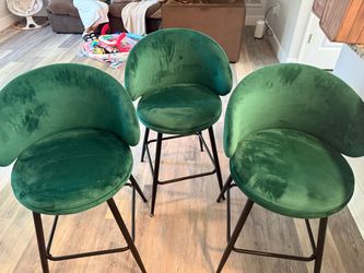 Green velvet chairs