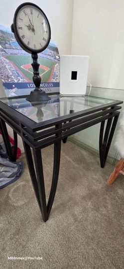 Black metal end tables and coffee table