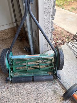 Manual push behind mower
