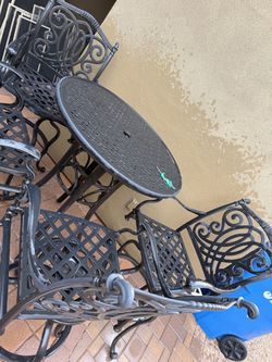 Outdoor bar table and stools