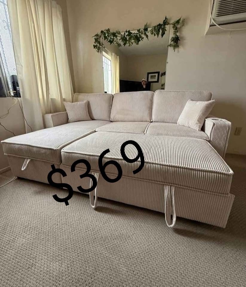 beige corduroy sectional sleeper sofa with storage chaise and pull out bed