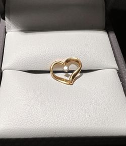 Beautiful solid 14k yellow gold pendant heart with a real diamond