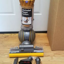 NEW cond DYSON  MULTI FLOOR 2 VACUUM WITH COMPLETE ATTACHMENTS  , AMAZING POWER SUCTION  , WORKS EXCELLENT  , IN THE BOX 
