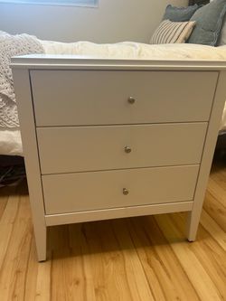 White bedside table