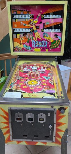 Firecracker pinball machine and table top arcade game