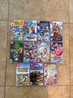 Various Nintendo Switch games in boxes multiple Mario games Mario Kart Mario Maker 2 Super Smash Bros