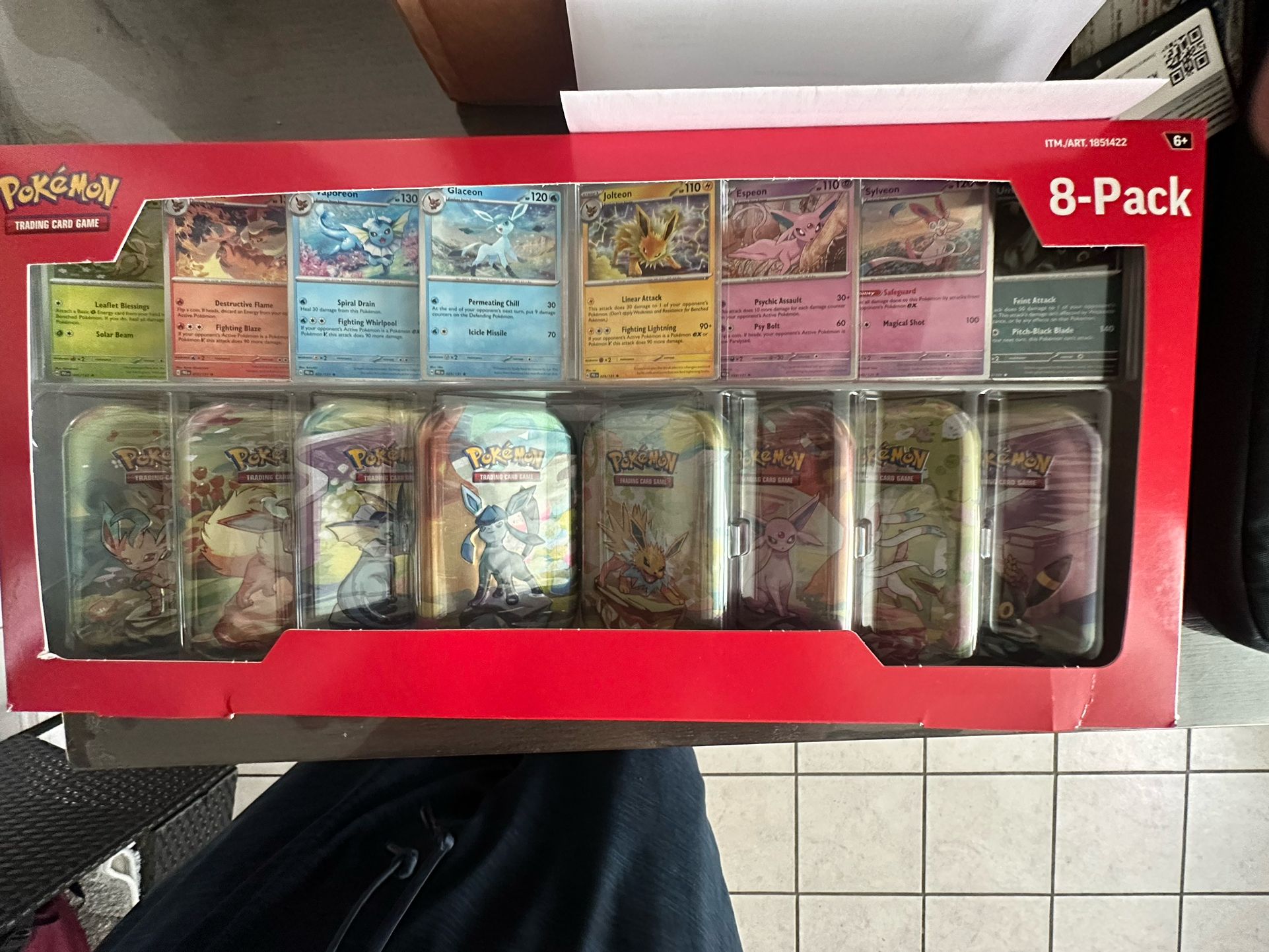 Prismatic Evolution Tins 