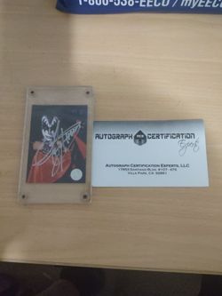 Autographed KISS Gene Simmons trading card with authenticity card