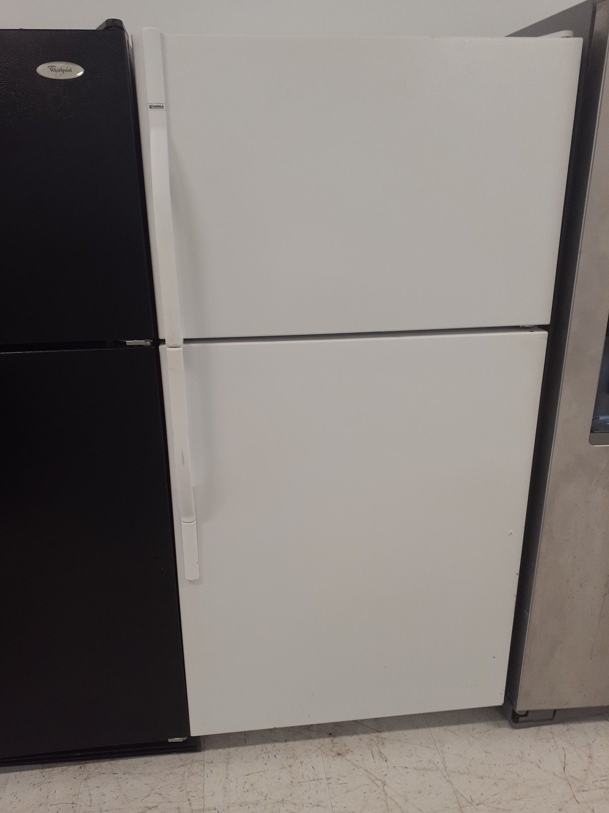 Kenmore top freezer refrigerator used in good condition with 90 day's warranty