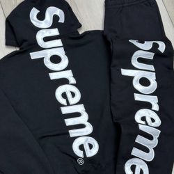 black and white supreme track suit goes for 800 only asking for 500