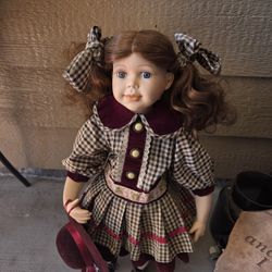 Hannah 22" Porcelain Doll pre owned condition