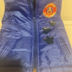 Paw patrol vest, stuffed animal and watch