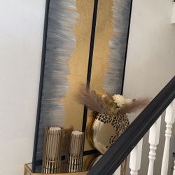 Cuadros dorados con gris y negro en muy buen estado $50 por los dos