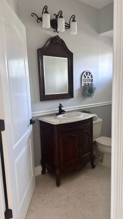 Retail value $1,400 Bathroom Vanity with Matching Mirror, Sink & Faucet