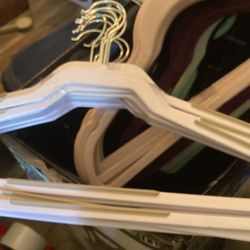 11 white and gray rubber hangers the gray is rubber