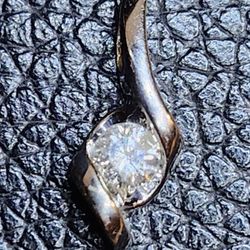 14 kt white gold  pendant with 1/ 4 ct diamond 