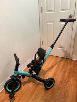 NEWYOO 5-in-1 Toddler Tricycle with Push Handle $40
