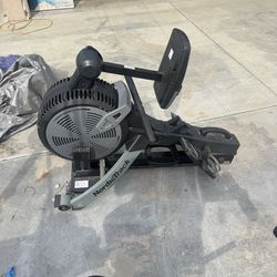 Nordic Track row machine & bench press