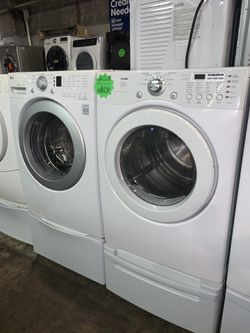 LG front load washer and electric dryer with pedestals in excellent conditions with 4 months warranty