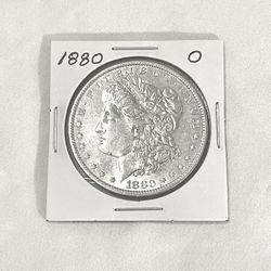 AU-(About Uncirculated) 1880-O Morgan Silver Dollar. 
