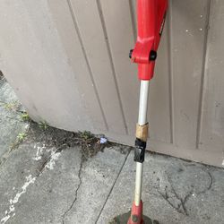 Battery Powered Weed Eater And REI 24” Co Op Bike