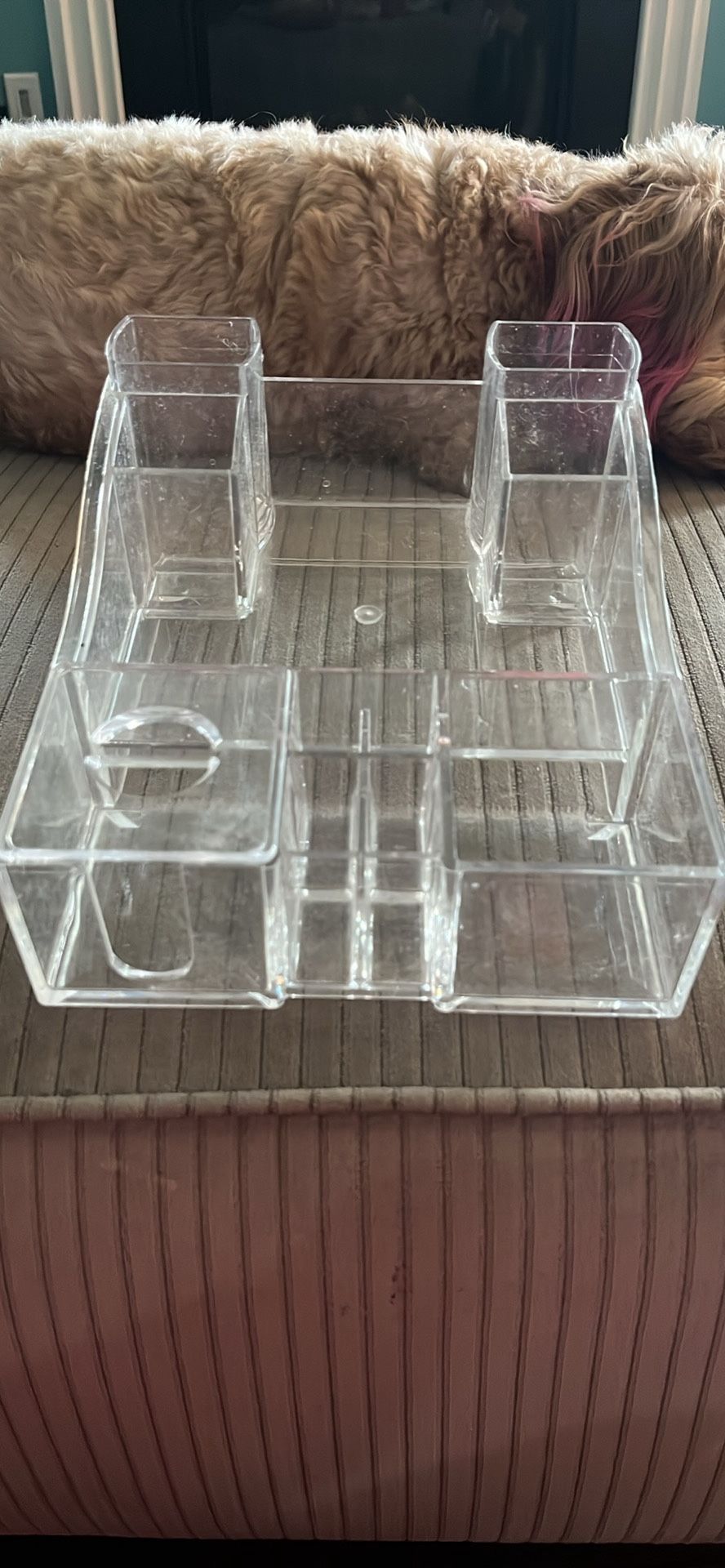 Clear plastic makeup container.