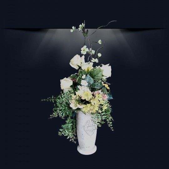 Elegant Asymmetrical Flower Arrangement in a Embossed Cement Vase
