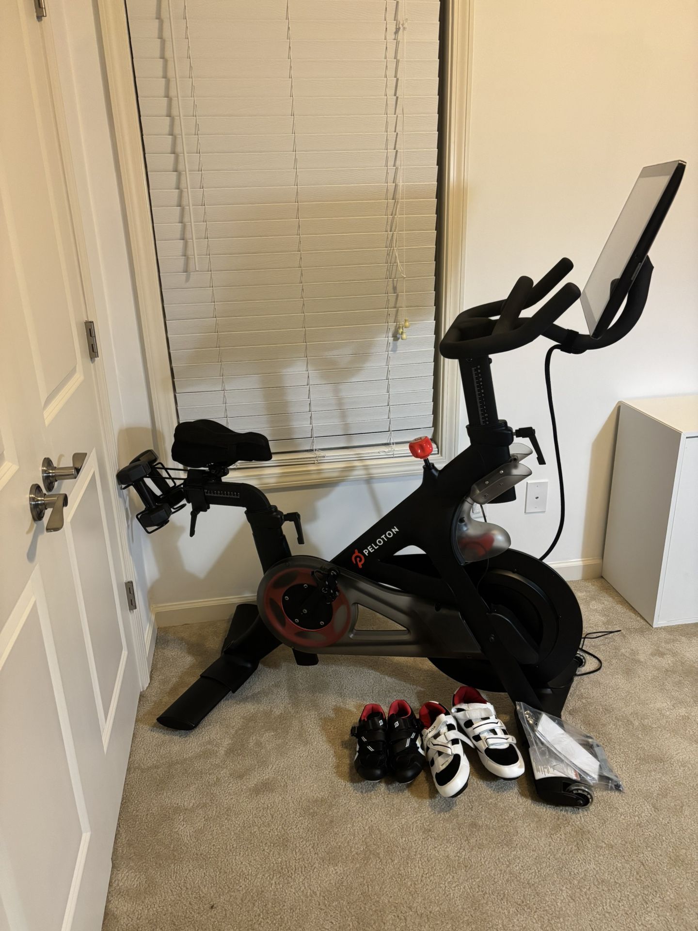 Peloton Bike (2022) – Excellent Condition w/ Weights + Shoes (Size 12)