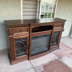 Brown Wood Electric Fireplace Heater.