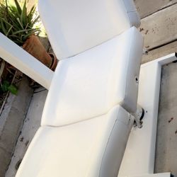 The chair for applying eyelash extensions is not adjustable.