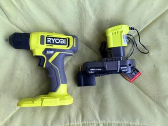 Ryobi drill with battery and charger