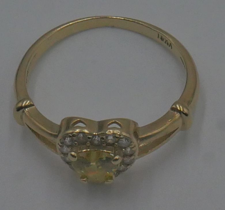 10kt yellow gold ring size 8.5 2.5 grams with yellow heart shaped stone and cubic zirconia .mint condition. 877649 1