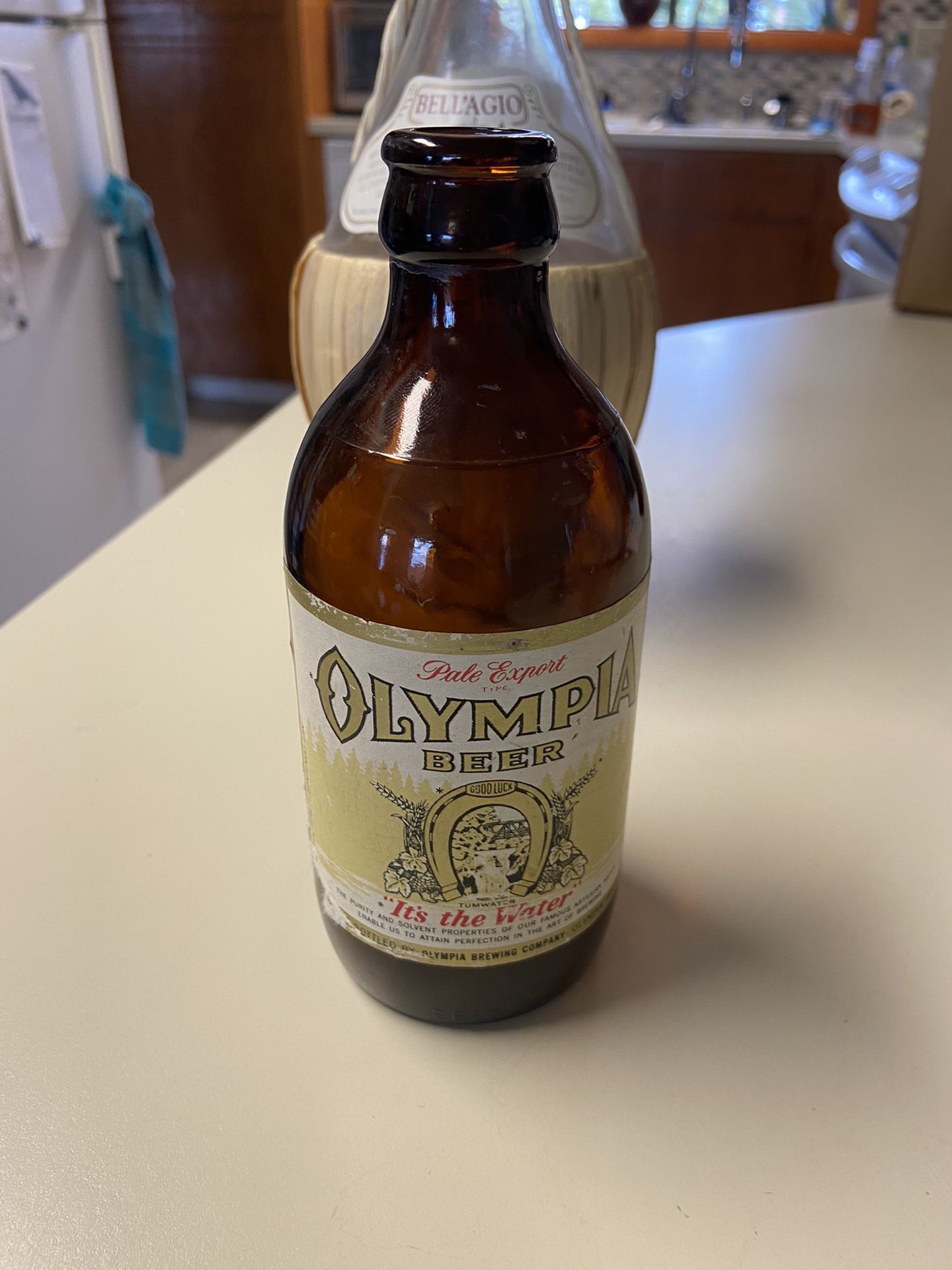 Olympia beer bottle. With 80% label