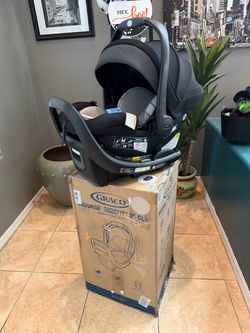 Brand New Graco SnugRide SnugFit DLX Infant Car Seat