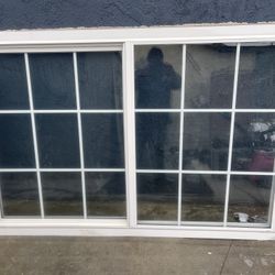 Window Vinyl Double Panel With Grids Retrofit Used   Width 69 inches  Height 46 inches 