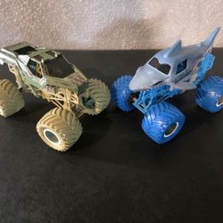 2 Monster Jam Official-  die-cast monster trucks for $20 