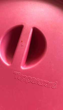 Pink Tupperware storage containers