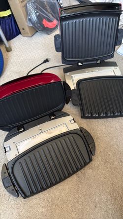 Two George Foremen grills with detachable plates