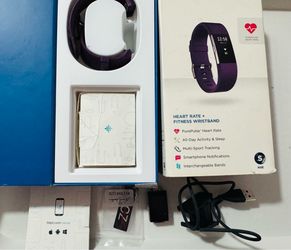 Fitbit Charge 2 - face changes modes & charger works - band needs replaced - $10 As is