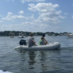 10 ft Zodiac with 8 hp mercury engine 