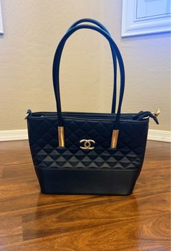 Black quilted purse handbag