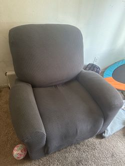 Brown Recliner w/ gray covers OBO