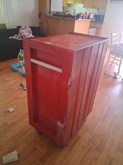 Red Wooden Storage Cabinet on Wheels