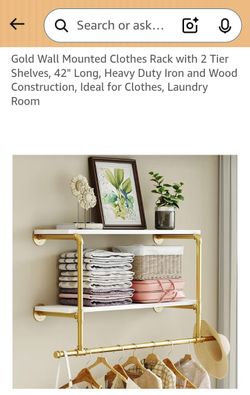 Gold clothing rack with 2 shelves