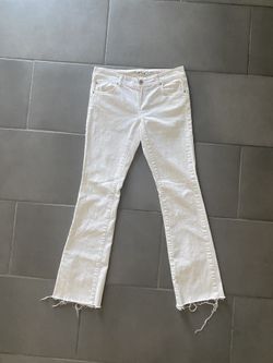 White Flared Jeans . Raw Edge
