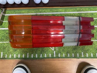 Mercedes Benz left driver side tail light lens 22072
