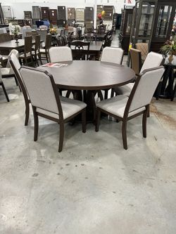 Seven Piece Round Dining Room Set
