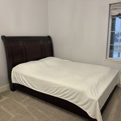 Queen size wooden bed