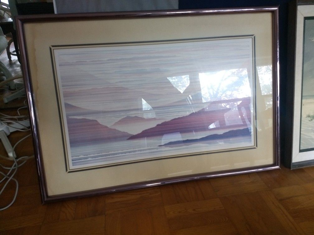 Scenery picture with glass cover surface and golden frame